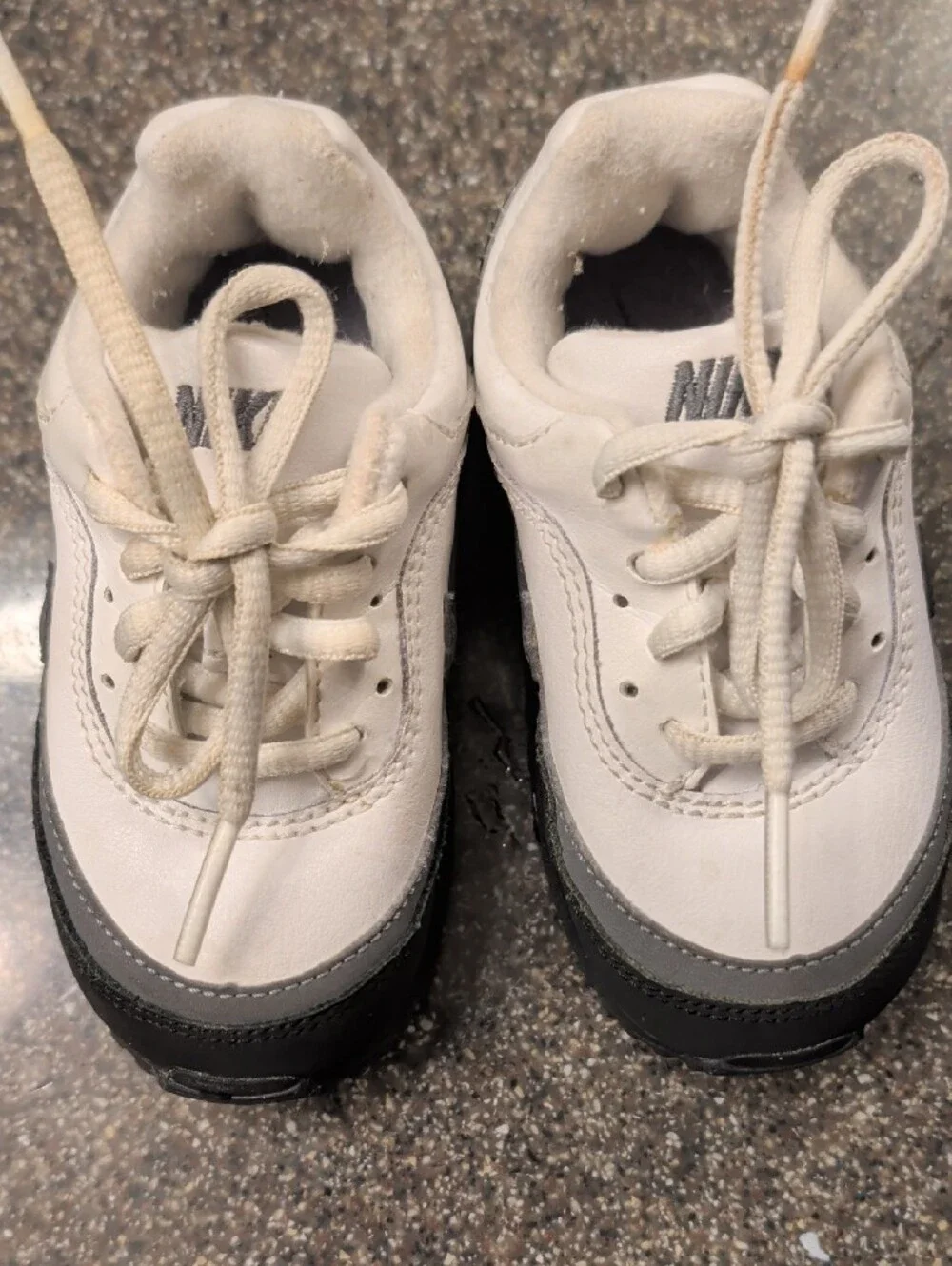 Nike Kids White and Black Low-Top Sneakers with Black Swoosh